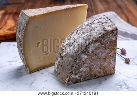 Cheese Tomme De Montagne Or Tomme De Savoie Made From Cow Milk In French Alps.