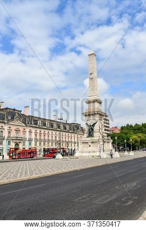 Lisbon, Portugal - July 3, 2019: Monument To The Restauradores At Restauradores Square Lisbon, Portu
