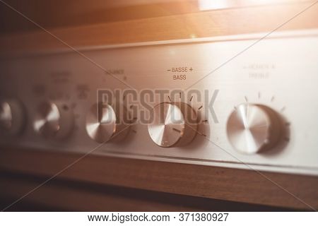 Silver Wooden Vintage Amplifier: Close Up Of Control Knobs