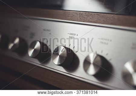 Silver Wooden Vintage Amplifier: Close Up Of Control Knobs