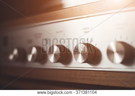 Silver Wooden Vintage Amplifier: Close Up Of Control Knobs