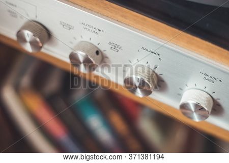 Silver Wooden Vintage Amplifier: Close Up Of Control Knobs