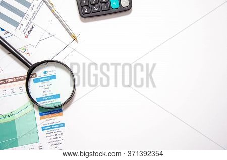 Closeup Baby Tree With Coins On Old Wooden Background. Business Financce And Saving Money Concpt.