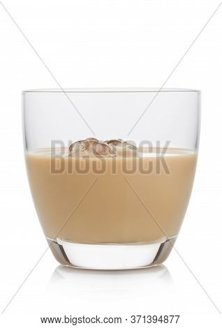 Glass With Ice Cubes Of  Whiskey And Cream Based Liqueur On White Background.