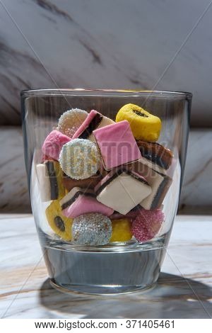 Colorful Gourmet English Licorice Candies On Marble Table