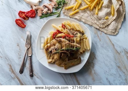 Creamy Italian Chicken Marsala With King Oyster Mushrooms And Sundried Tomatoes Served Over Penne Ri
