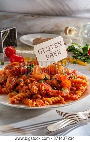Gluten-free Fusilli Pasta In Creamy Vodka Tomato Sauce With Sausage Shrimp And Green Peas