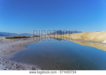 Reflections In A Pan At The Bonnievale Salt Flats