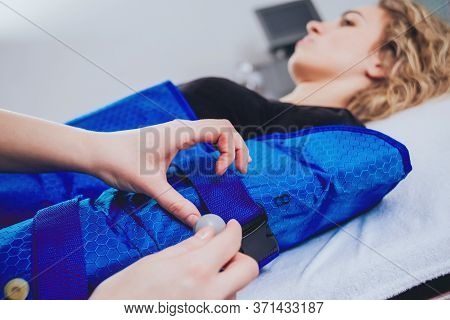 Pressotherapy Machine On Woman In Beauty Center