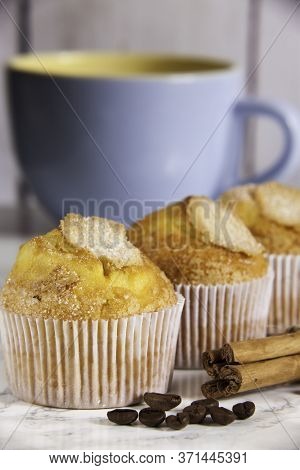 Delicious Cupcakes, Cinnamon And Blue Ceramic Cup