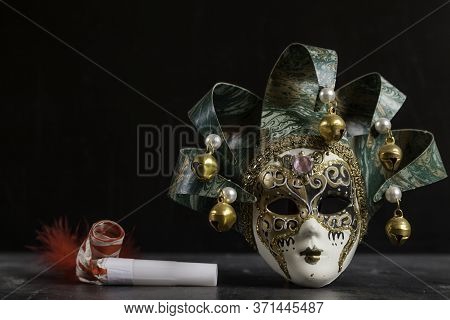Venetian Carnival Mask And Matasuegras