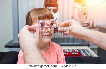 Trial Frame. Glasses Prescription For A Child. Childs Hypermetropy.