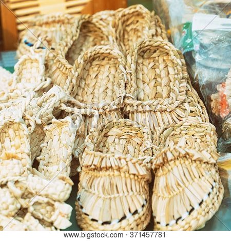 Souvenir Bast Shoes Woven From Bast. Old Traditional Russian Shoes