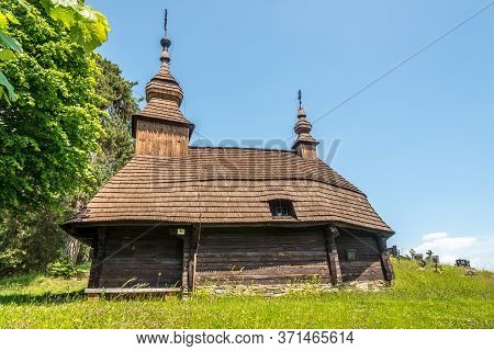 Inovce,slovakia - June 8,2020 - View At The Wooden Church Of Saint Michael Archangel In Inovce Villa