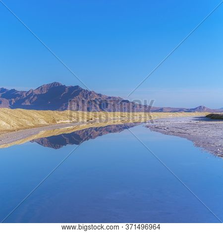 Square Crop Reflection In Still Water At Bonnievale Salt Flats