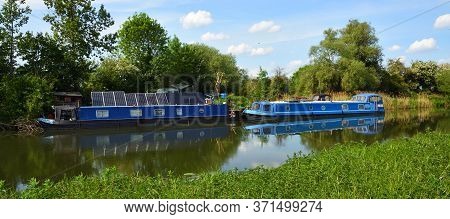 St Neots, Cambridgeshire, England - May 09, 2020:  Alternative Living In Narrow Boat On The River Ou