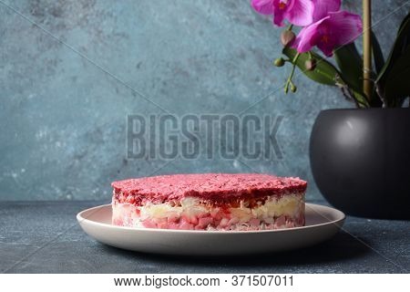 Layered Salad With Herring, Beets, Carrots, Onions, Potatoes And Eggs. 