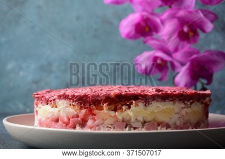 Layered Salad With Herring, Beets, Carrots, Onions, Potatoes And Eggs. 