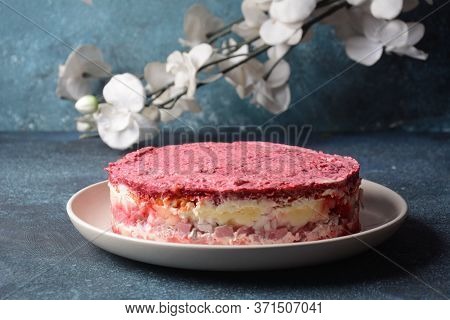 Layered Salad With Herring, Beets, Carrots, Onions, Potatoes And Eggs. 