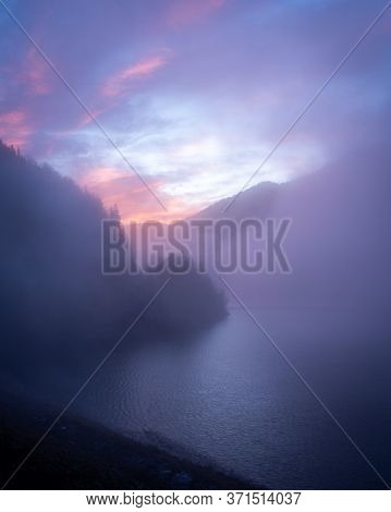Autumn Morning At Sylvenstein Reservoir In Bavaria With Lots Of Fog