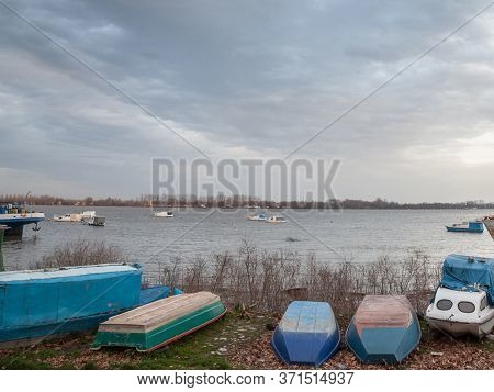 Boats And Ships, Some Fishing Ships And Old And Rusty Abandoned Boats Standing On The Riverbanks Of 
