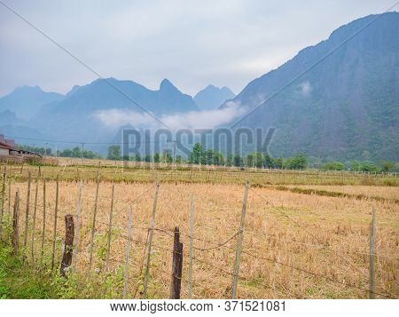 Beautiful Mountains And Field Of Vangvieng City.vangvieng City The Famous Holiday Destination Town I