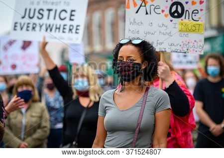 Richmond, North Yorkshire, Uk - June 14, 2020: A Powerful Black Female Leader Wears A Black Lives Ma