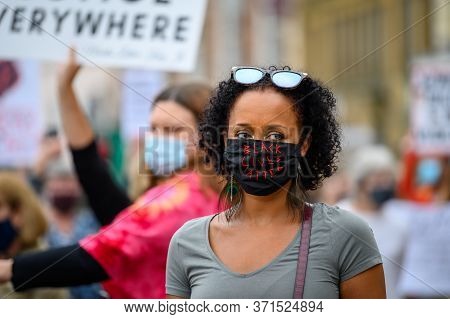 Richmond, North Yorkshire, Uk - June 14, 2020: A Powerful Black Female Leader Wears A Black Lives Ma