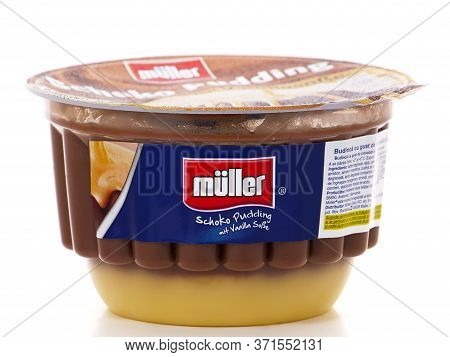 Bucharest, Romania - February 25, 2015. Muller Chocolate And Vanilla Pudding, Produced By Molkerei A