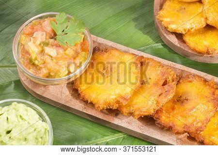Patacón Fried Flattened Pieces Of Green Plantain (tostón, Tachino)
