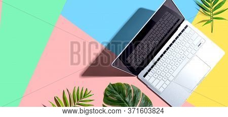 Laptop Computer With Tropical Plants - Flat Lay