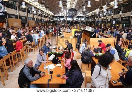 Lisbon, Portugal - June 6, 2018: People Eat At Timeout Market In Lisbon, Portugal. Timeout Market Is