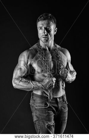 Fight For Fitness. Fit Man With Metal Chain Black Background. Athletic Guy With Muscular Torso. Sexy