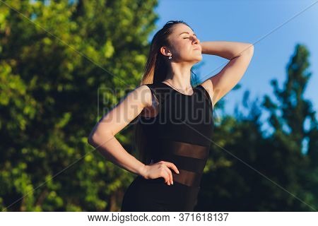 Tired Runner Sweating After Running Hard In Countryside Road. Exhausted Sweaty Woman After Marathon 