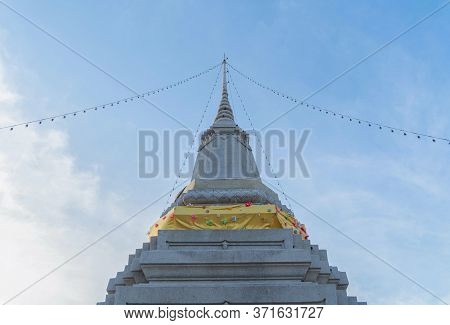 Wat Chantharam Worawihan Or Wat Klang Talat Phlu, A Buddhist Temple Stupa At Noon With Blue Sky In B
