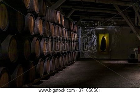 Porto, Portugal - May 31, 2018: Stored Branded Barrels Of Port Wine On Display At Sandeman Cellar, P