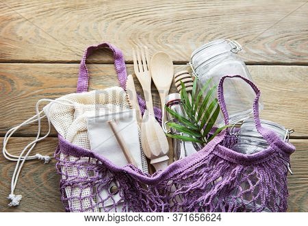 Cotton Bags, Net Bag With Reusable  Glass Jars, Bamboo And Wooden Cutlery. Zero Waste Concept. Eco F