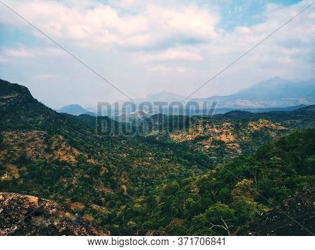 A Beautiful View Of Hills From One Of The Hill . Green Everywhere With Clouds Hiding The Beauty Of O