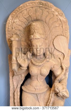 MUMBAI, INDIA - FEBRUARY 14, 2020: Statue of Dancing Vaishnavi from 8th century exposed in the Prince of Wales Museum, now known as The Chhatrapati Shivaji Maharaj Museum in Mumbai, India