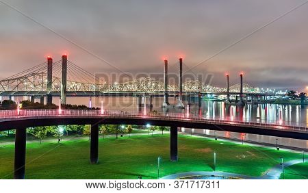 The Abraham Lincoln Bridge And The John F. Kennedy Memorial Bridge Across The Ohio River Between Lou