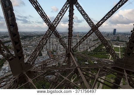 Paris Panorama View Front Eiffel Tower Lift Throughout The Steel Bars Screwed To Each Others, France