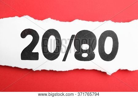 Sheet Of Paper With Numbers 20 And 80 On Red Background, Top View. Pareto Principle Concept