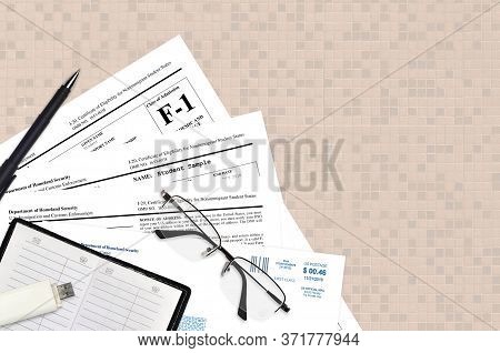 Uscis Form I-20 Certificate Of Eligibility For Nonimmigrant Student Status Lies On Flat Lay Office T