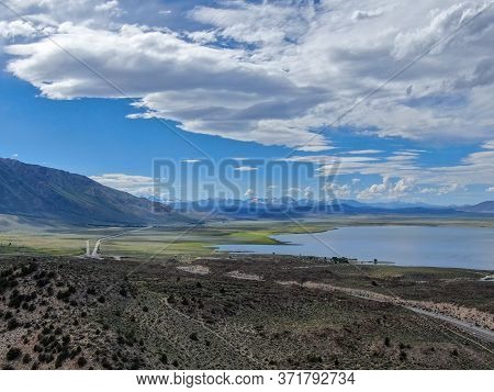 Aerial View Of Lake Crowley Over The Mountain During Hot Summer Day. Mono County, California, Usa