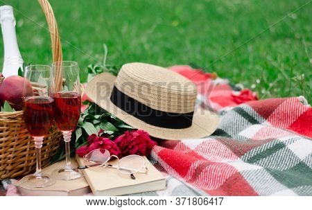 Mood Reading A Picnic Book Under A Glass Of Red Wine