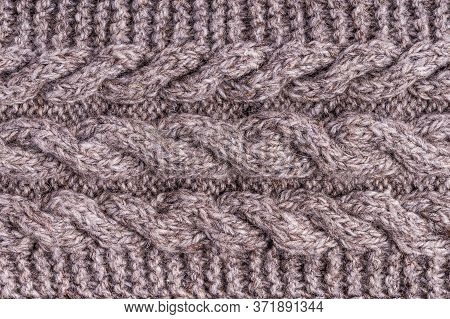 Wool Grey Knitted Texture. Woolen Gray Cloth, Handmade. Textile Ornament. Fashion Knitwear. Light Wo