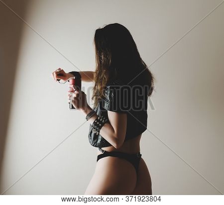 Beautiful Sexy Girl In Black With Red Manual Coffee Grinder