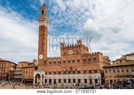Siena Tuscany, Italy, April, 2018: Public Palace, Palazzo Pubblico In Campo Square, Piazza Del Campo