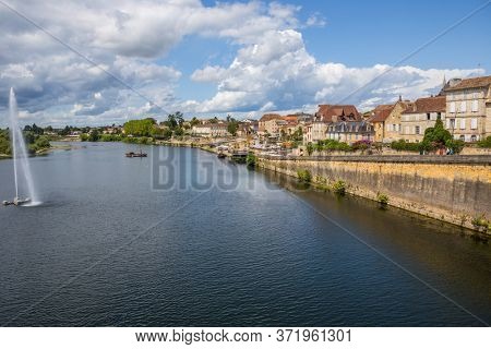 BERGERAC, FRANCE - AUGUST 12, 2019: Dordogne Riverfront in Bergerac. The town has an important tourist industry.