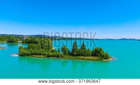 Aerial View Over Lake Forggensee At The City Of Fuessen In Bavaria Germany